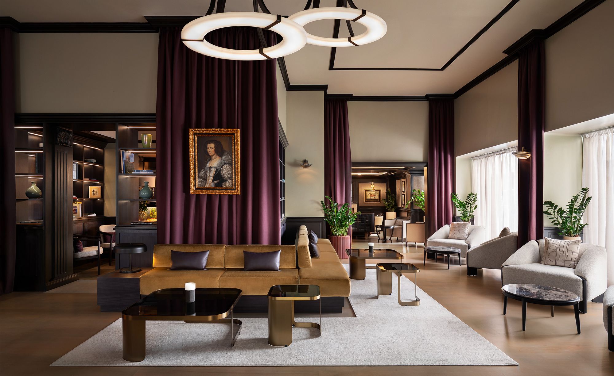 A family salon in deep red and dark wood